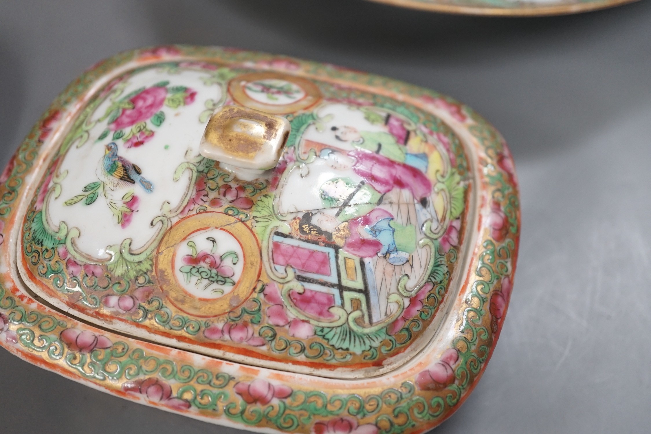 A group of 19th century Chinese famille rose porcelain - two soap dishes, strainers and covers, a plate and a pen box base